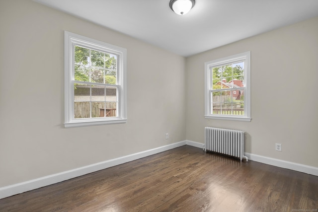 5 Skiff Pkwy, North Haven, CT 06473 - unfurnished room featuring radiator and dark wood-style floors