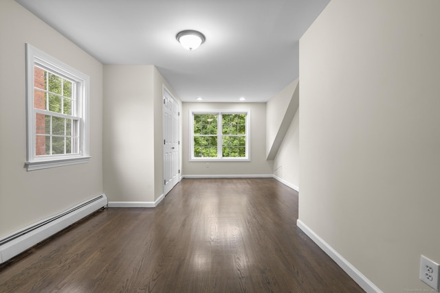 5 Skiff Pkwy, North Haven, CT 06473 - unfurnished room with a baseboard radiator, dark wood finished floors, and healthy amount of natural light