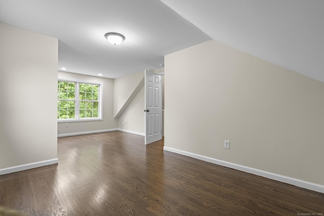 5 Skiff Pkwy, North Haven, CT 06473 - spare room with dark wood finished floors, vaulted ceiling, and recessed lighting
