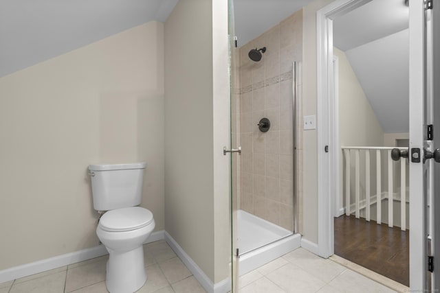 5 Skiff Pkwy, North Haven, CT 06473 - bathroom featuring a stall shower, tile patterned floors, and vaulted ceiling