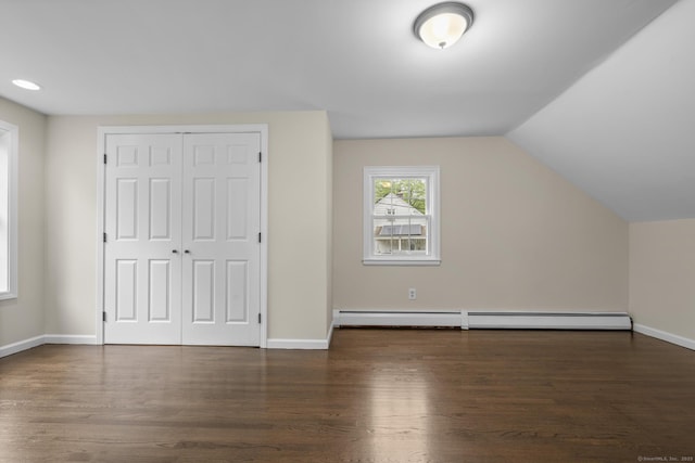 5 Skiff Pkwy, North Haven, CT 06473 - additional living space with a baseboard radiator, wood finished floors, and lofted ceiling