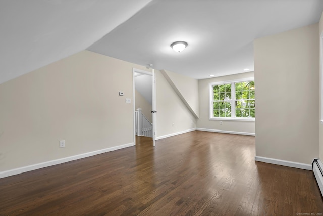 5 Skiff Pkwy, North Haven, CT 06473 - unfurnished room featuring wood finished floors, a baseboard heating unit, and vaulted ceiling