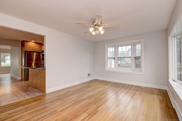 30 Birch St, Stratford, CT 06615 - spare room featuring light wood-style floors and ceiling fan