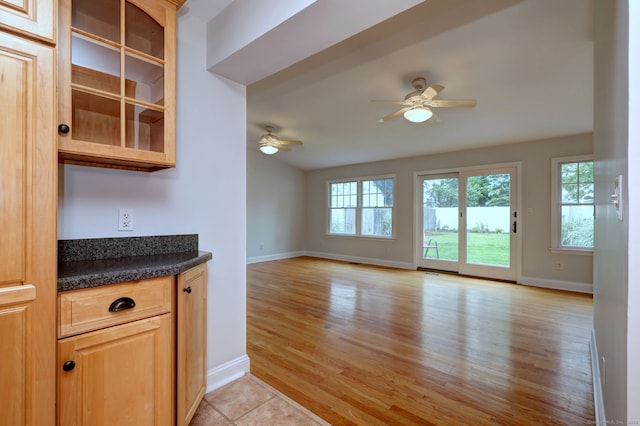 30 Birch St, Stratford, CT 06615 - kitchen with ceiling fan, dark countertops, light wood-style floors, and open floor plan