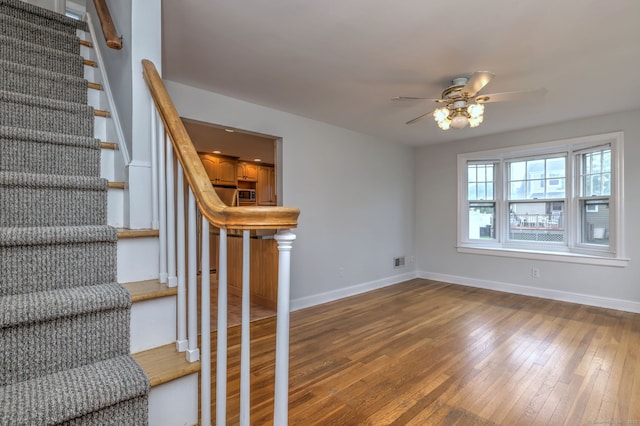 30 Birch St, Stratford, CT 06615 - staircase with wood-type flooring and ceiling fan