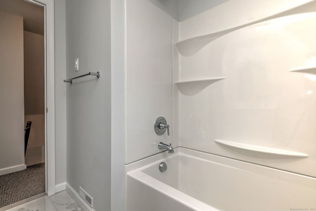 30 Birch St, Stratford, CT 06615 - bathroom with bathtub / shower combination and marble look tiles