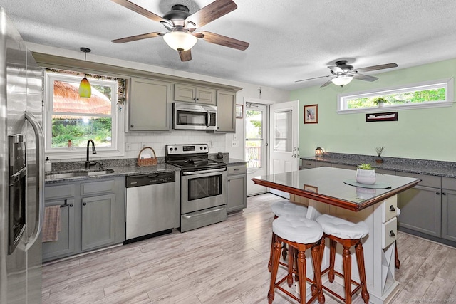 47 Little Bungee Hill Rd, Woodstock, CT 06282 - kitchen with stainless steel appliances, gray cabinets, ceiling fan, and a textured ceiling