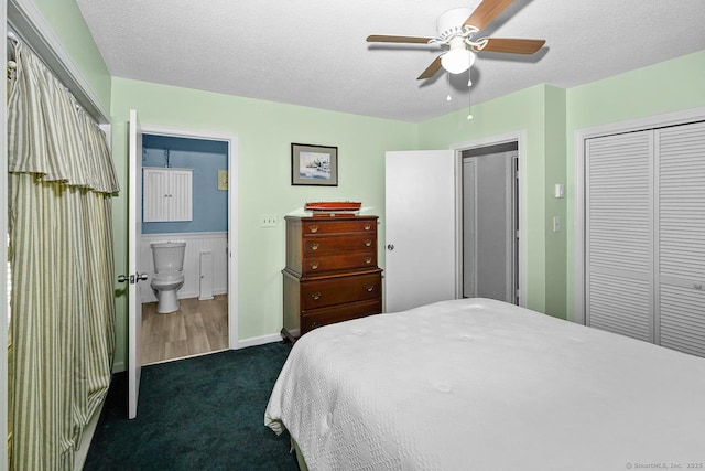 47 Little Bungee Hill Rd, Woodstock, CT 06282 - bedroom featuring dark colored carpet, a closet, ensuite bathroom, a textured ceiling, and ceiling fan