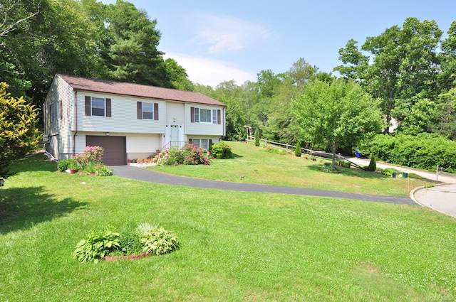 8 Pons Rd, Groton, CT 06355 - split foyer home with a garage and asphalt driveway