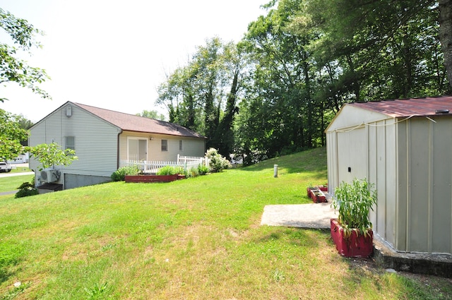 8 Pons Rd, Groton, CT 06355 - view of grassy yard with a shed and a patio area