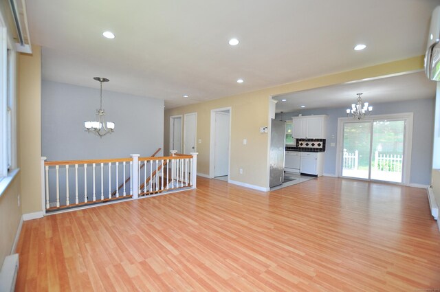 8 Pons Rd, Groton, CT 06355 - unfurnished room featuring a chandelier, light wood-type flooring, and recessed lighting