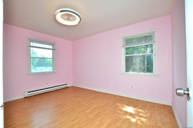 8 Pons Rd, Groton, CT 06355 - unfurnished room with baseboard heating and light wood finished floors
