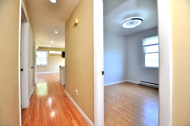 8 Pons Rd, Groton, CT 06355 - hall featuring baseboard heating, light wood-type flooring, plenty of natural light, a wall mounted air conditioner, and recessed lighting