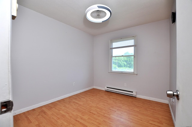 8 Pons Rd, Groton, CT 06355 - unfurnished room featuring baseboard heating and light wood-type flooring