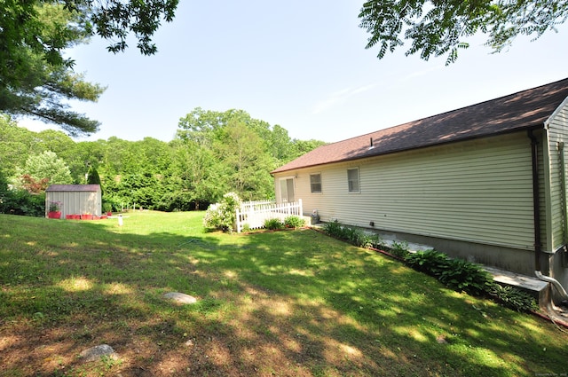 8 Pons Rd, Groton, CT 06355 - view of green lawn with a storage shed
