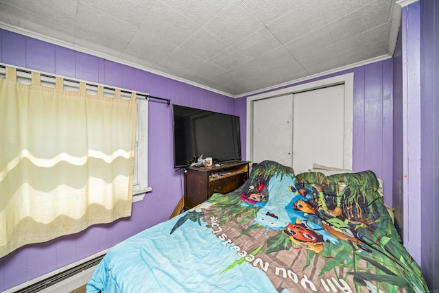 42 Goodwin St, Torrington, CT 06790 - bedroom with a baseboard heating unit, crown molding, and a closet