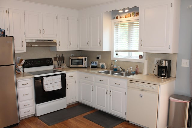 176 Atwater St Apt 7, Southington, CT 06479 - kitchen with stainless steel appliances, under cabinet range hood, white cabinetry, and light countertops