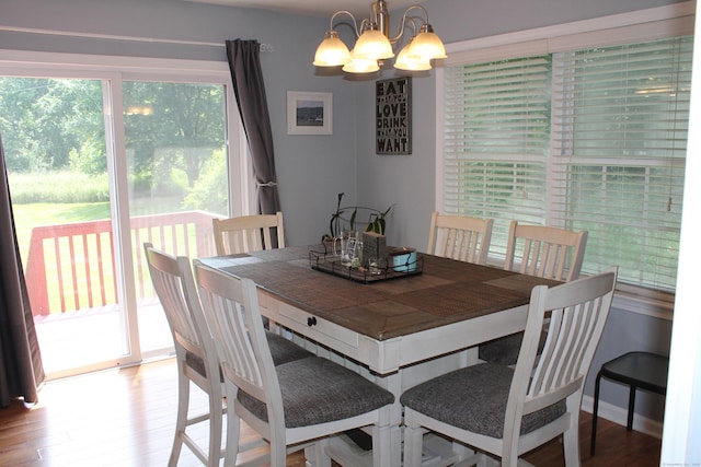 176 Atwater St Apt 7, Southington, CT 06479 - dining area with a chandelier and wood finished floors
