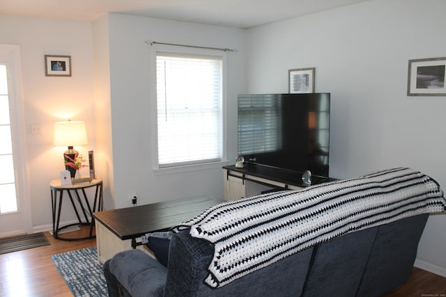 176 Atwater St Apt 7, Southington, CT 06479 - bedroom featuring multiple windows and wood finished floors