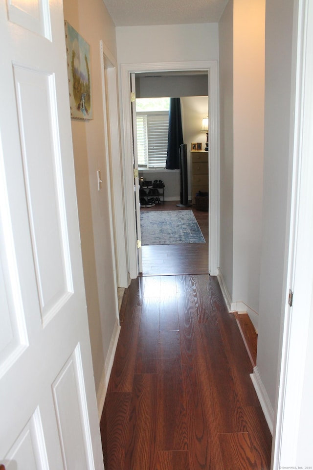 176 Atwater St Apt 7, Southington, CT 06479 - hallway with wood finished floors and baseboards