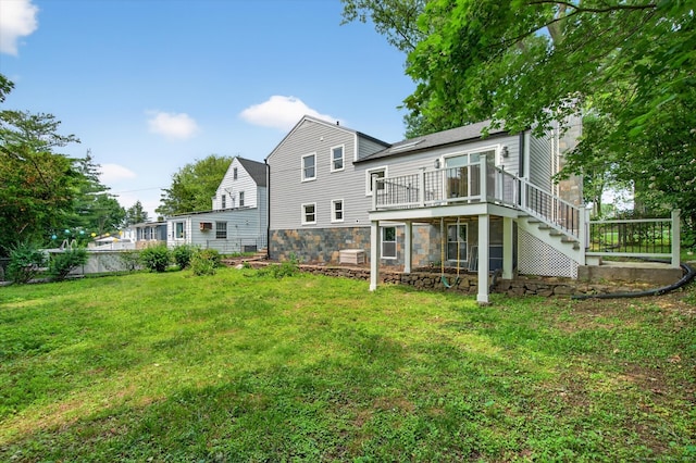 3481 Park Ave, Fairfield, CT 06825 - rear view of house featuring stairway, stone siding, and a deck
