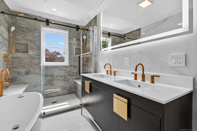 3481 Park Ave, Fairfield, CT 06825 - bathroom with tile walls, crown molding, healthy amount of natural light, double vanity, and marble tiled floors