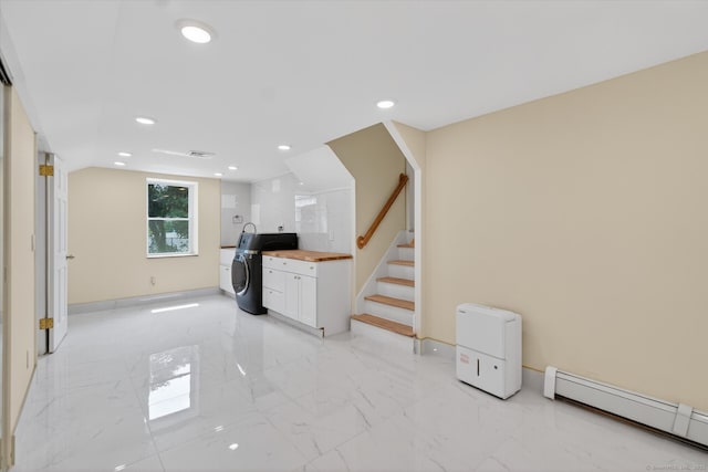 3481 Park Ave, Fairfield, CT 06825 - interior space with a baseboard heating unit, washer / clothes dryer, light marble finish flooring, recessed lighting, and stairs