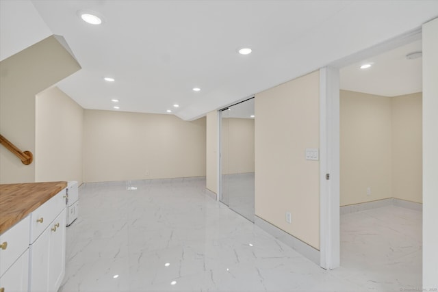 3481 Park Ave, Fairfield, CT 06825 - finished basement with light marble finish floors and recessed lighting