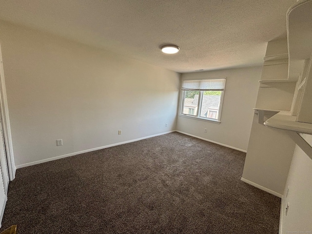167 High Top Cir W Unit 167, Hamden, CT 06514 - empty room with dark colored carpet and a textured ceiling