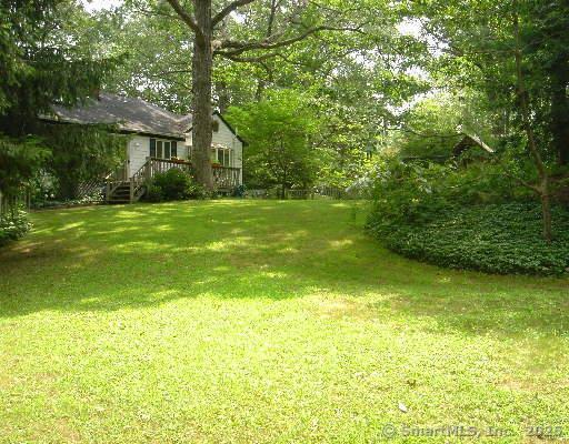 7 White Birch Rd, Wilton, CT 06897 - view of grassy yard featuring a wooden deck