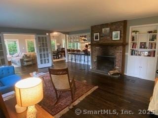 7 White Birch Rd, Wilton, CT 06897 - living area featuring a fireplace and wood finished floors