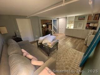 7 White Birch Rd, Wilton, CT 06897 - living area featuring wood finished floors and stairway