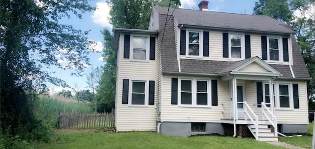 476 Park Ave, Bloomfield, CT 06002 - colonial inspired home with a chimney and roof with shingles