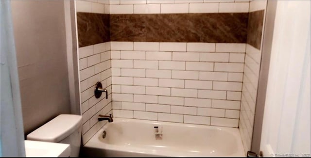 476 Park Ave, Bloomfield, CT 06002 - bathroom featuring toilet and bathing tub / shower combination