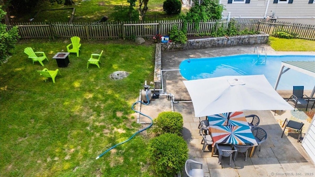 12 Deacon Hill Rd, Stamford, CT 06905 - view of swimming pool featuring a patio, a fenced backyard, and outdoor dining space