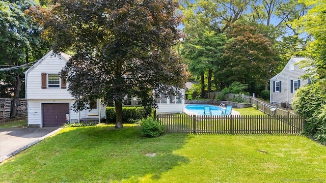 12 Deacon Hill Rd, Stamford, CT 06905 - view of yard with an attached garage and driveway