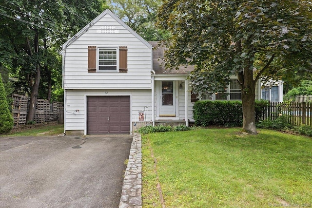 12 Deacon Hill Rd, Stamford, CT 06905 - view of front of home featuring a garage and asphalt driveway
