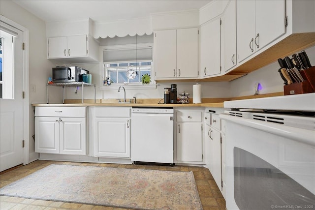 12 Deacon Hill Rd, Stamford, CT 06905 - kitchen featuring white dishwasher, white cabinetry, light countertops, stainless steel microwave, and stove