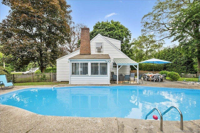 12 Deacon Hill Rd, Stamford, CT 06905 - view of pool with an outbuilding, a storage structure, and a patio area