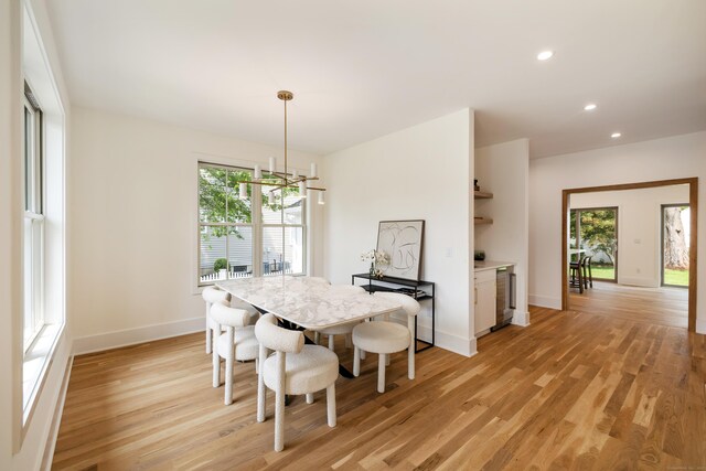 1846 Mill Plain Rd, Fairfield, CT 06824 - dining room with recessed lighting, light wood-style floors, and a chandelier