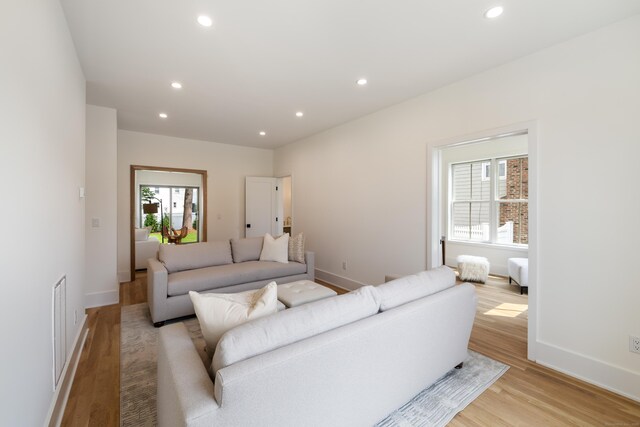 1846 Mill Plain Rd, Fairfield, CT 06824 - living area featuring light wood-style flooring and recessed lighting