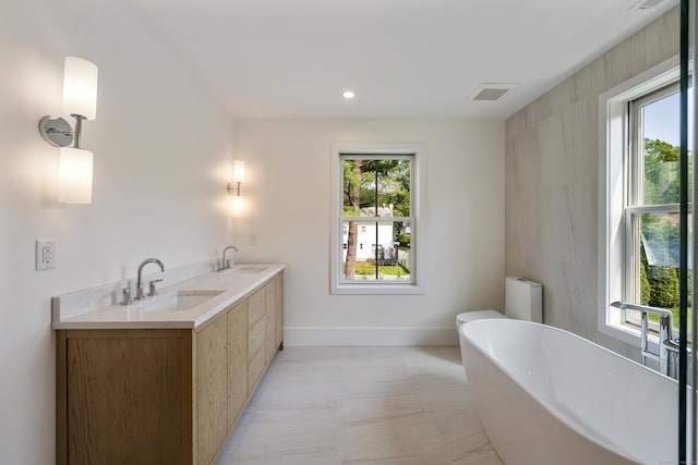 1846 Mill Plain Rd, Fairfield, CT 06824 - full bathroom with a freestanding tub and double vanity