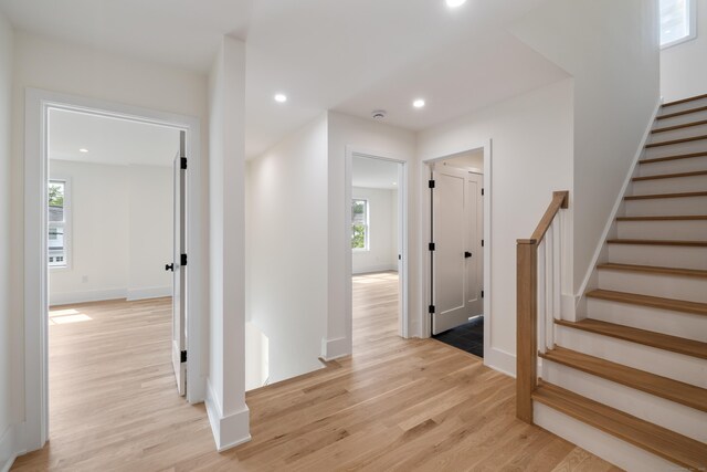 1846 Mill Plain Rd, Fairfield, CT 06824 - hall with light wood-style floors, healthy amount of natural light, recessed lighting, and stairway