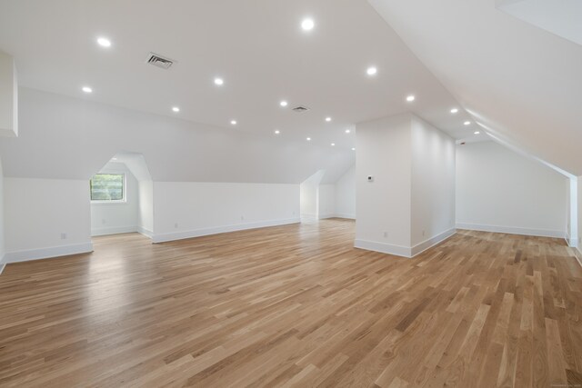 1846 Mill Plain Rd, Fairfield, CT 06824 - additional living space with light wood-style flooring, lofted ceiling, and recessed lighting