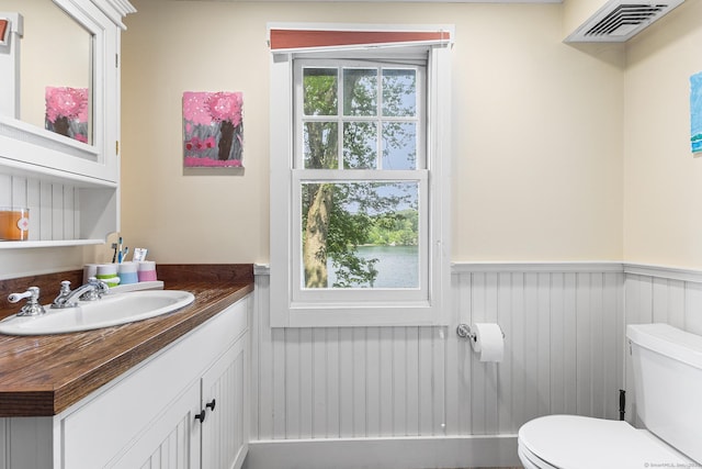 45 Lake Dr S, New Fairfield, CT 06812 - half bath featuring a wainscoted wall and vanity