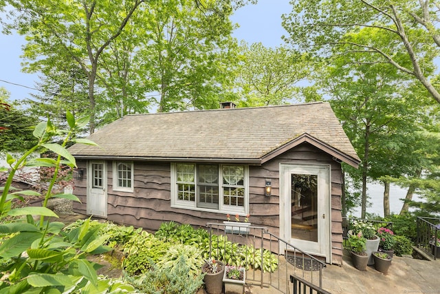 45 Lake Dr S, New Fairfield, CT 06812 - back of house featuring roof with shingles