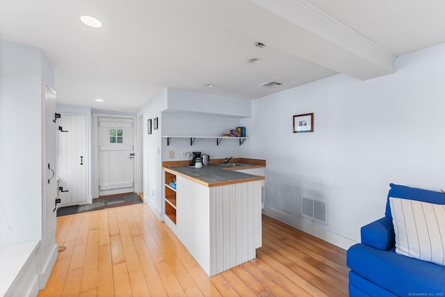 45 Lake Dr S, New Fairfield, CT 06812 - kitchen with open shelves, light wood-style floors, recessed lighting, and tile countertops