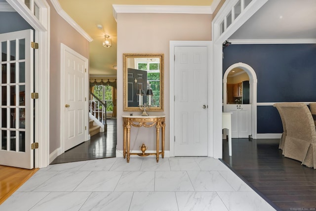 40 Pumpkin Ground Rd, Stratford, CT 06614 - entrance foyer featuring ornamental molding, marble finish floors, stairway, and arched walkways