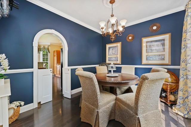 40 Pumpkin Ground Rd, Stratford, CT 06614 - dining room with crown molding, a chandelier, wood finished floors, and arched walkways