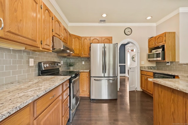 40 Pumpkin Ground Rd, Stratford, CT 06614 - kitchen with appliances with stainless steel finishes, under cabinet range hood, arched walkways, ornamental molding, and light stone counters